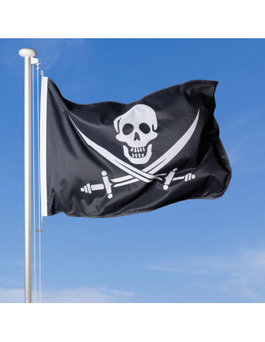 bandiera pirata che sventola al vento sul pennone, cielo blu sullo sfondo
